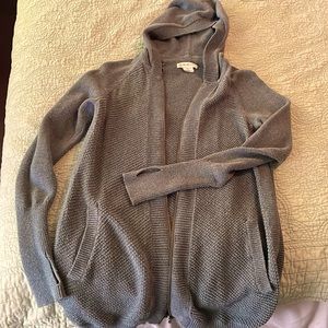 Beautiful sage colored fitted long zip up sweater with hood.